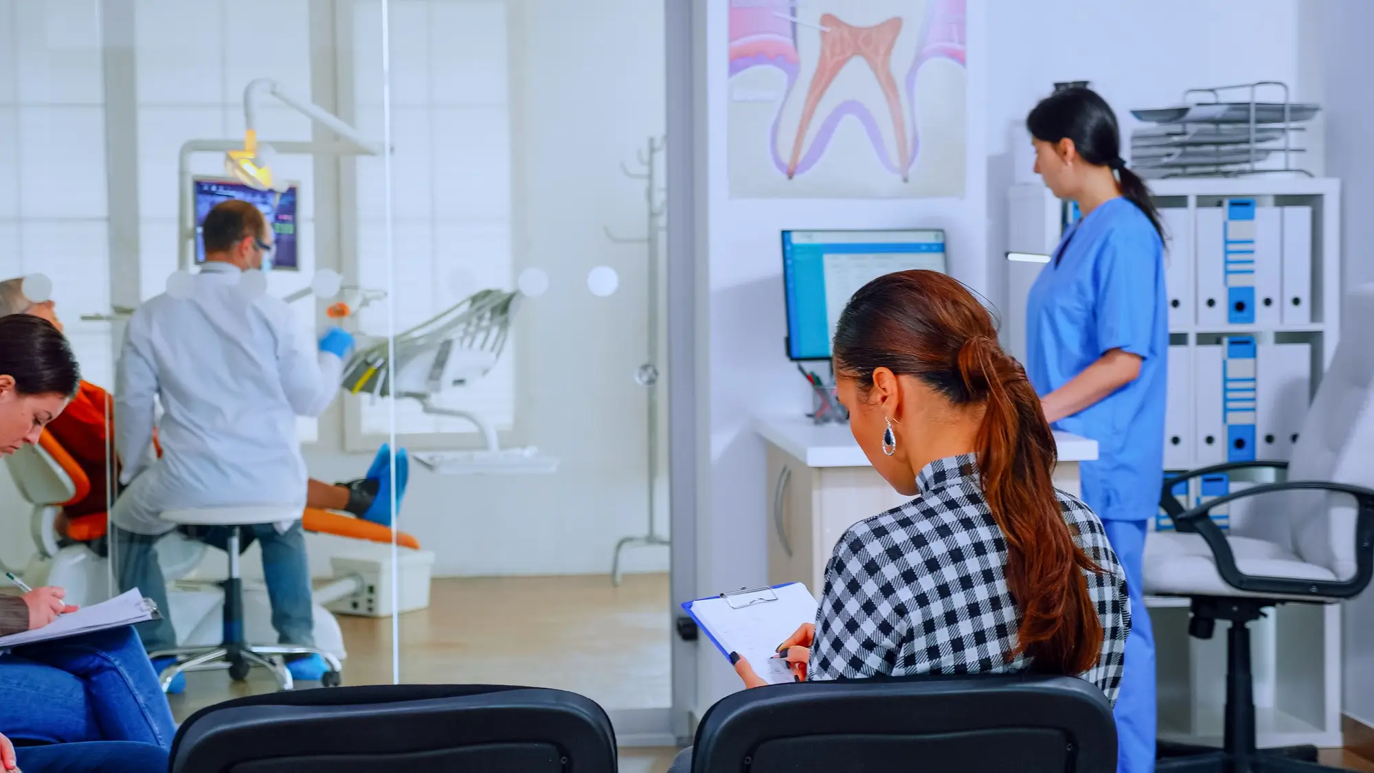 Patients asking informations filling in dental document preparing Patients asking informations filling in dental document preparing