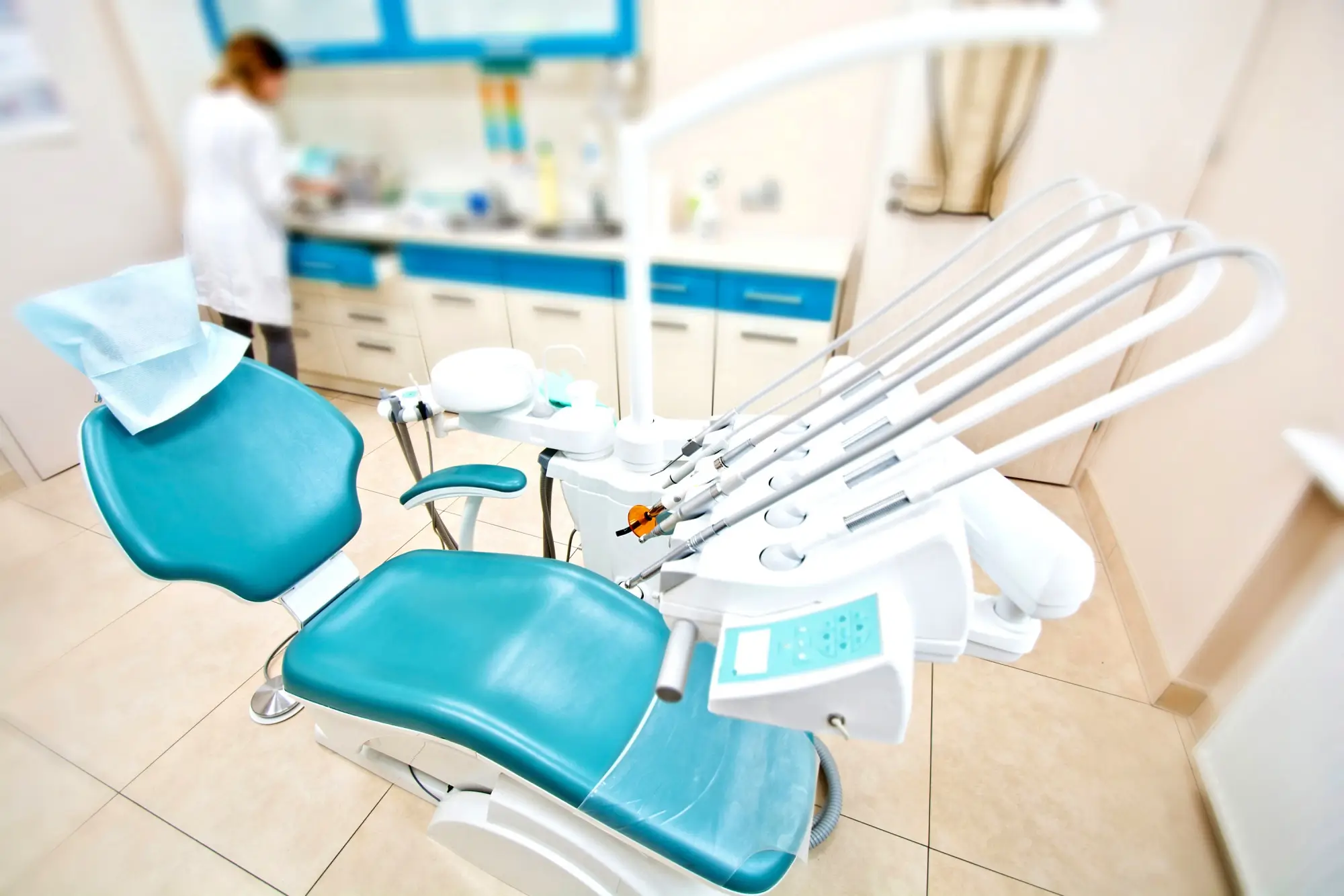 Professional dentist tools and chair in the dental office. Professional dentist tools and chair in the dental office